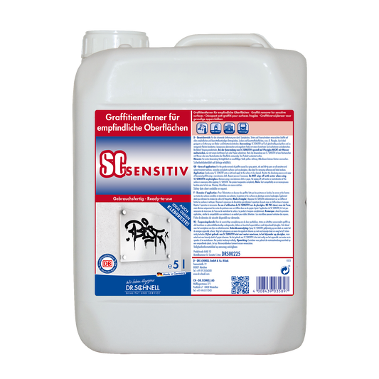 Ein weißer 5L-Behälter SC SENSITIV Graffitientferner für empfindliche Oberflächen von DR.SCHNELL GmbH & Co. KGaA, mit deutscher Gebrauchsanweisung auf dem Etikett und einem kleinen Bild der Graffitientfernung.