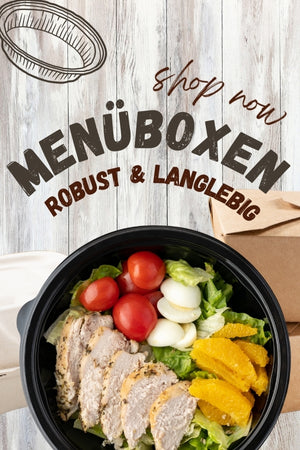 Ein Bild einer Menübox mit Salat, Tomaten, Zwiebeln und einer Scheibe Fleisch. Darüber steht der Text