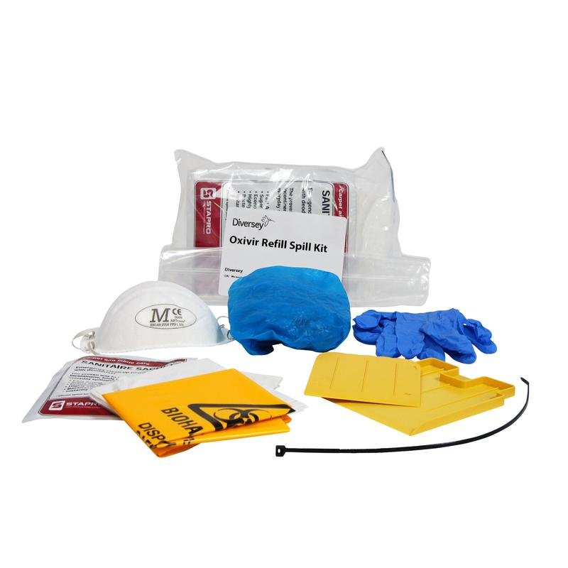 Shown is the Diversey Spill Kit Refill (2 pieces) from Diversey Deutschland GmbH & Co. OHG, with face mask, blue hair protection, gloves, yellow bags for biological hazards, absorbent pads, cable ties, and cleaning solution on a white background.