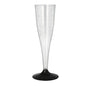 A crystal-clear Starpak sparkling wine glass (PS, 0.1 l, Ø 5 cm, 17.5 cm) with a black base stands against a white background. Shrink wrap packaging (5 pieces). Ideal for festive occasions.