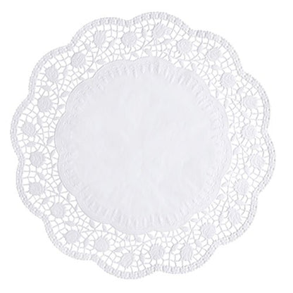 The PAPSTAR 100 round, white doilies from PAPSTAR GmbH is a round white doily with a solid core and a filigree, lace-like wavy edge with floral and geometric patterns made from FSC-certified material.