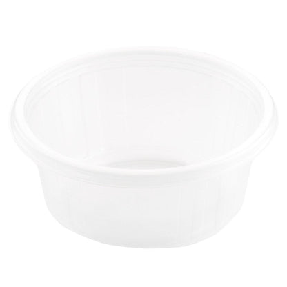 The Fixpack® round Transparent PP container from Duni GmbH is a clear, round empty container with a slightly raised edge, shown in an oblique top view against a solid white background.