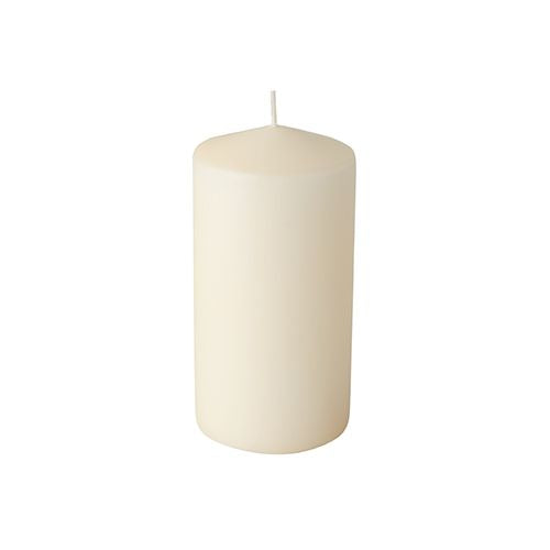 The Starpak 6 pillar candles (Ø 60 mm, 115 mm) of the Starpak brand in simple white stand upright against a white background, each with a single, unlit wick and long burning time.