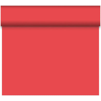 A partially unrolled Dunicel table runner Tête-à-Tête 24 m x 0.4 m (20 sections) by Duni GmbH adds a stylish accent to your table decoration with its smooth surface and rolled edge.