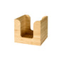 The Duni GmbH bamboo napkin holder 11x11 cm is a stylish, square bamboo table organizer with curved cutouts on the sides, ideal for holding napkins or coasters.
