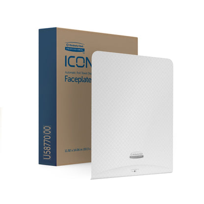 A white, textured Kimberly-Clark Professional™ Icon™ Dispenser Faceplate (33.02 x 37.47 x 3.18 cm) by Kimberly-Clark GmbH stands upright in front of a brown and blue box - ideal for modern washroom accessory needs.