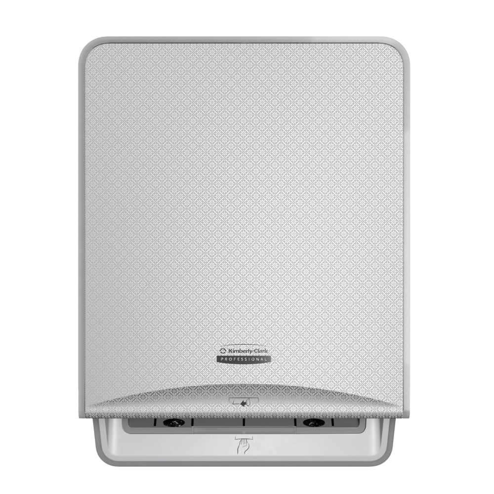 Eine silberne Mosaik, wandmontierte Kimberly-Clark Professional™ Icon™ elektronische No Touch-Losse Modul-Rolle von Kimberly-Clark GmbH mit einer gemusterten Frontplatte, zentralem Logo und einem Schlitz an der Unterseite für berührungslose Handtuchabgabe.