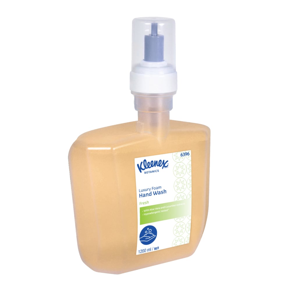 A rectangular, clear plastic bottle of Kleenex® Botanics™ Luxury Foam Hand Wash by Kimberly-Clark GmbH has a pump dispenser, orange liquid, a detailed label, and a 1.2-L cassette (1200 ml). The package contains 4 electronic cassettes per carton.