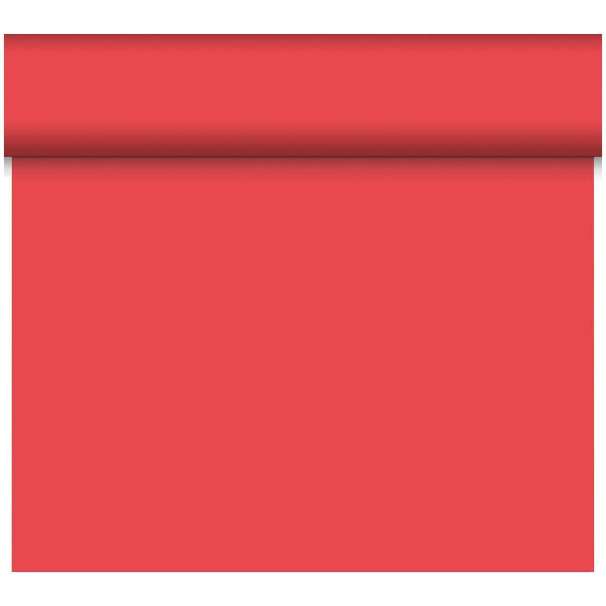 Tá ról de Bio-DC Tete a Tete (0,4x24m, dearg) ó Duni GmbH, déanta as ábhar ardchaighdeáin, á rolladh amach go páirteach, agus an stiall ag dul síos os comhair cúlra bán.