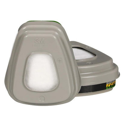 Depicted are two gray 3M™ Filter Set 6004-1 ABEK1P3 Combination Filter Cartridges (2x6059, 2x5935, 2x501) from 3M Deutschland GmbH - one standing, one lying - with visible labels and markings. The package contains 1 piece.