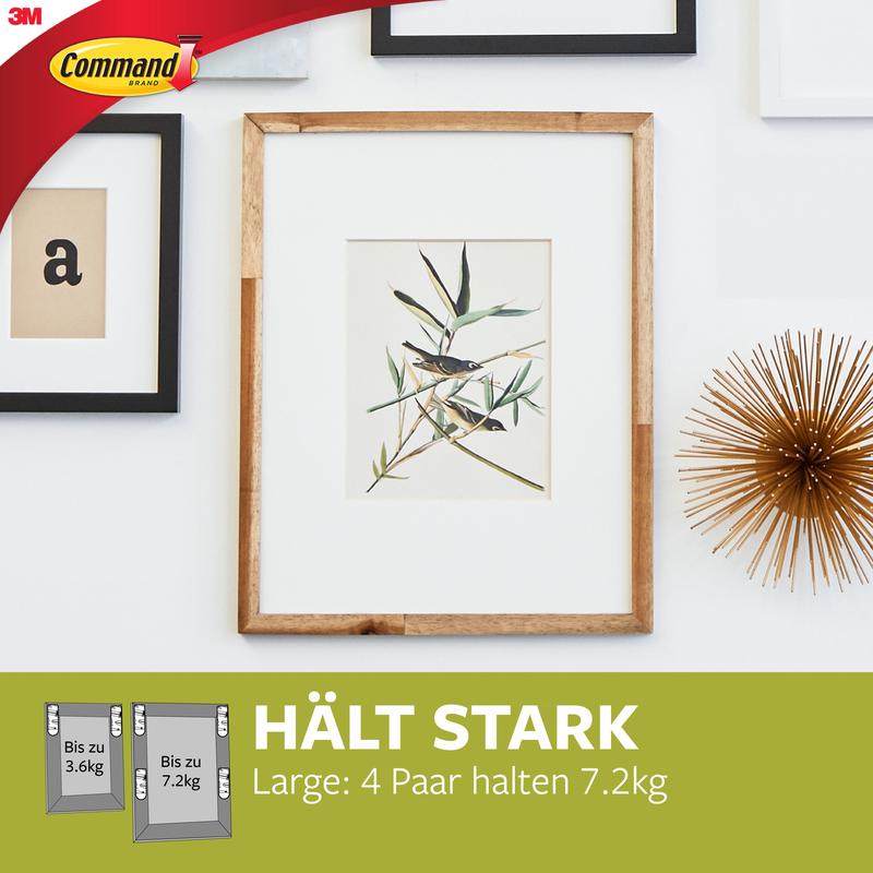 A wooden picture frame with botanical art hangs on a white wall, attached with Large Command™ Picture Hanging Strips L, 12 sets in the value pack (17206-12) by 3M Deutschland GmbH - completely without drilling and damage-free.