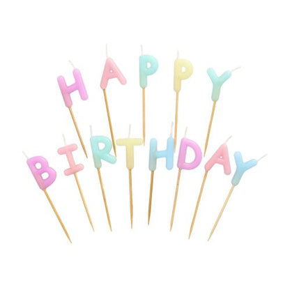 The PAPSTAR letter candle set features pastel-colored letter candles with the inscription "Happy Birthday" (8 cm), each on a wooden stick. Available in pink, yellow, blue, purple, and green. Sold in a box with 12 packs by PAPSTAR GmbH.