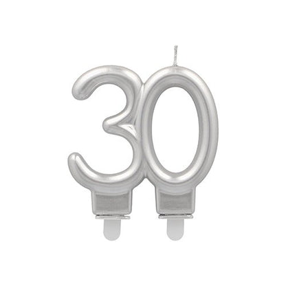 A silver PAPSTAR anniversary candle with holder 7 cm from PAPSTAR GmbH, in the shape of the number 30 with two small white bases and a wick - ideal for anniversary celebrations.