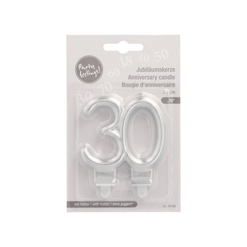 A package from PAPSTAR GmbH contains two anniversary candles with holder (7 cm, silver) in the shape "30" for anniversaries, with multilingual packaging and a transparent plastic cover for easy use.
