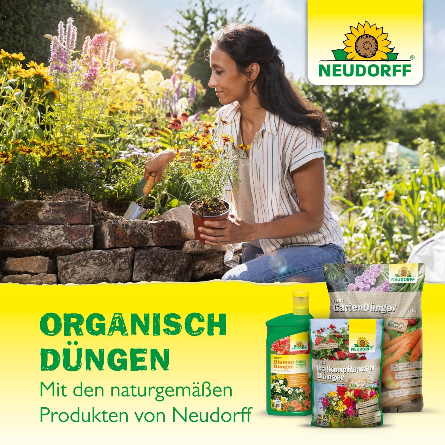 A woman kneels in the garden and tends to the flowers with a trowel. Bags and bottles of Neudorff Shop Azet Perennial Fertilizer can be seen, indicating the organic fertilization of perennials with the natural product from Neudorff Shop.