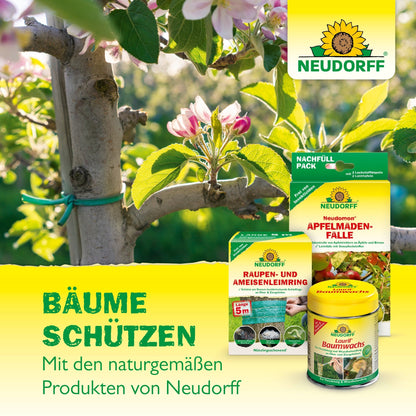 Close-up of a blossom-covered branch surrounded by Aurum Insect Glue from Neudorff Shop for tree protection. The text reads: "Protect trees. With the natural Aurum Insect Glue from Neudorff Shop."