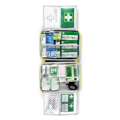 The LARGE DIN first aid kit from Orkla Wound Care AB contains bandages, gauze, cold packs, scissors, adhesive tape, antiseptic wipes, and first aid instructions - neatly organized in labeled compartments. Package: 1 piece.