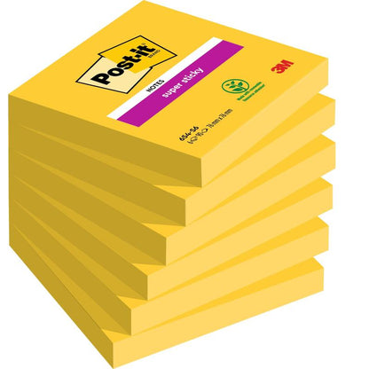 A pack of six rectangular Post-it® Notes in yellow, 76 x 76 mm, 90 sheets per block from 3M Deutschland GmbH. The top block is labeled with a magenta "Super Sticky" label. Made from 100% PEFC-certified paper (SGSCH-PEFC-COC-110078).