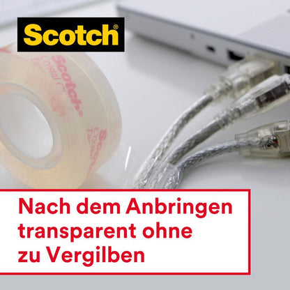 A roll of Scotch® Crystal Tape (19mm x 25m + 5m FREE, 1 dispenser) from 3M Deutschland GmbH lies next to cables and a silver laptop. Label: "Transparent after application without yellowing.