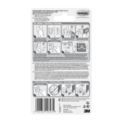 The Command™ Strips 17021B, waterproof (Size M, 10/pack) from 3M Deutschland GmbH feature illustrated application instructions, safety instructions, multilingual text, barcode, and the 3M logo - ideal for mounting without drilling in the bathroom.