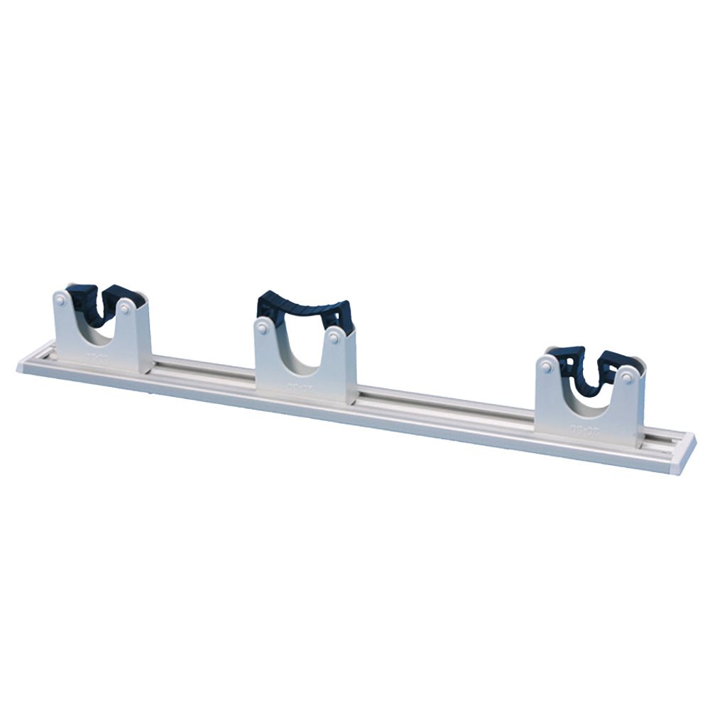 The hanging rail from Diversey Deutschland GmbH & Co. OHG (package, 1 piece) is a horizontal metal holder with three U-shaped plastic holders for securely mounting brooms or mops on the wall.