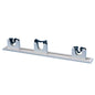 The hanging rail from Diversey Deutschland GmbH & Co. OHG (package, 1 piece) is a horizontal metal holder with three U-shaped plastic holders for securely mounting brooms or mops on the wall.