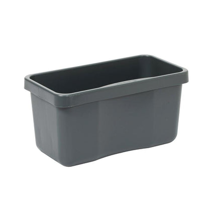 The TASKI mop box without lid from Diversey Deutschland GmbH & Co. OHG is a rectangular, dark gray storage container made of plastic with rounded corners and a wide rim, ideal for efficient cleaning solutions; depicted empty on a white background.