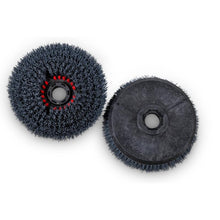 Two round black Longlife brushes (22.5 cm/8.5") from Diversey, depicted bristle side with a red ring and flat back with a mounting hole. Delivered in a box with 2 pieces for TASKI swingo 250µicro as replacement brushes.