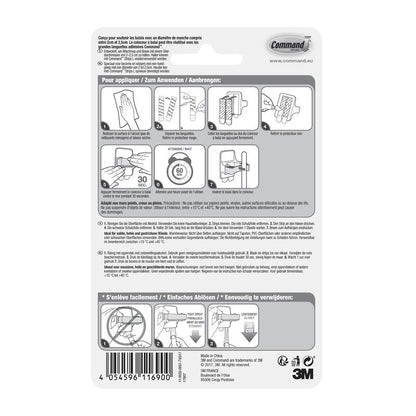 The back of a Command™ broom holder, 17007-FR packaging from 3M Deutschland GmbH, shows a pictorial, multilingual instruction for attaching and removing the holder with Command adhesive strips. Diagrams guide step by step through the assembly and disassembly.