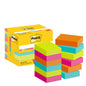 A yellow box of Post-it® Notes (3M Deutschland GmbH, Poptimistic Collection, 38 x 51 mm, 100 sheets/block, 12 blocks/package) stands next to stacks of square sticky notes in bright yellow, pink, blue, orange, and green.