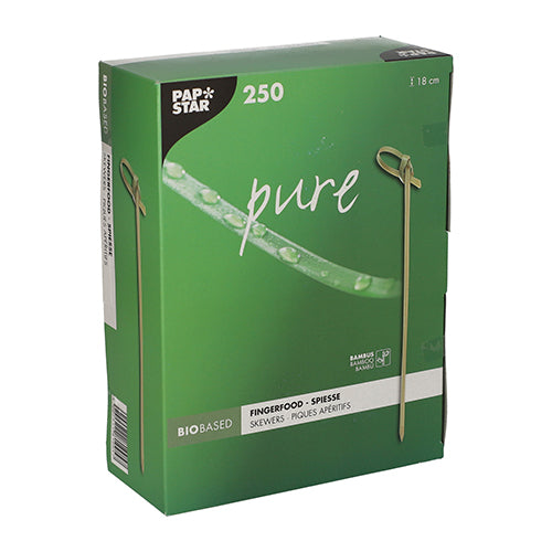 A green box of PAPSTAR 250 Fingerfood-Picker "pure" of PAPSTAR GmbH, each 18 cm long and biodegradable; the packaging shows skewer images and water droplets on a leaf.