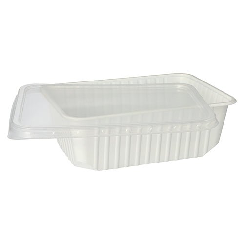A rectangular, white Starpak 50 packaging cup made of PP (1l, 6.3×18.6×13.3cm) with a slightly raised clear lid and ribbed sides is ideal for food storage and is currently empty.