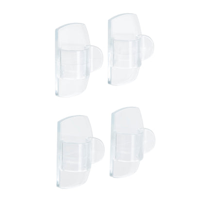 Four Command™ transparent clips for round cables, 17017CLR from 3M Deutschland GmbH, are arranged in two rows on a white background, each with a rounded front and a flat back for easy wall mounting and cable management.