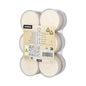 A transparent plastic packaging with 12 Starpak Maxi tealights (Ø 55 mm, 20 mm, white) with approximately 8 hours of burning time, each in a polycarbonate holder. The label shows the brand, product details, application symbols, safety instructions, and a barcode.