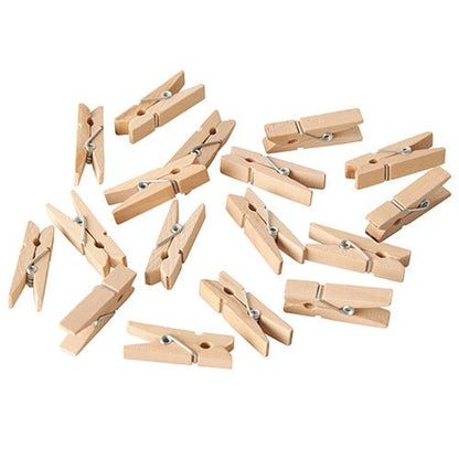 A pack of 100 PAPSTAR mini wooden clips (3.5 cm), ideal for craft projects, from PAPSTAR GmbH, is scattered on a white background.