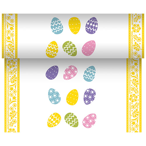The PAPSTAR table runner, fabric-like Airlaid (24 m x 40 cm) from PAPSTAR GmbH features a white base with a yellow floral border and colorful Easter eggs - ideal for elegant table decoration at festive occasions.