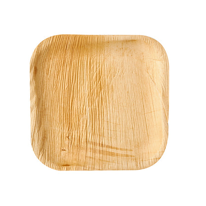 Is pláta indiúscartha atá neamhdhíobhálach don chomhshaol é an PAPSTAR 6 phláta "pure" cearnach déanta as duille pailme ón PAPSTAR GmbH, le gráin le feiceáil agus coirnéil chothromaithe, curtha i láthair ar chúlra bán.