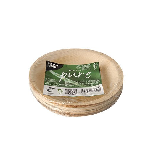 A stack PAPSTAR "Pure" round palm leaf bowls, 13 cm, eco-friendly (set of 6) from PAPSTAR GmbH is packaged in shrink wrap—ideal sustainable disposable tableware for eco-conscious events.