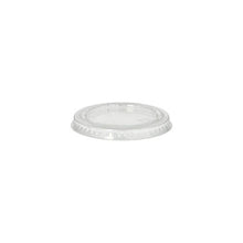 The transparent, round PAPSTAR lid for portion cups (Ø 6 cm, PLA "pure") from PAPSTAR GmbH is displayed on a white background with a flat top and raised, ribbed edge for a secure fit. Package contains 50 biodegradable lids.