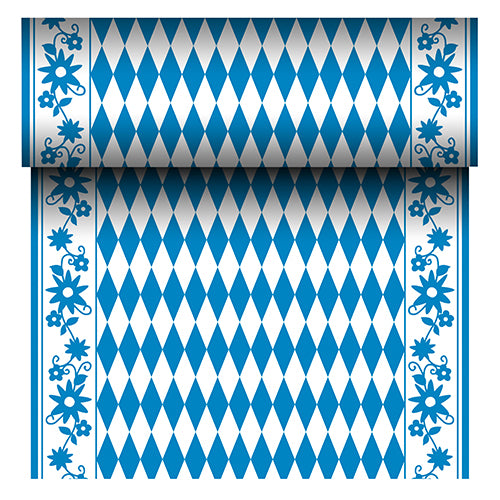 Der PAPSTAR Tischläufer (24 m x 40 cm, Airlaid) in der Farbe „Bayrisch Blau“ mit weißem Rautenmuster und blauen Blumenbordüren ähnelt einem traditionellen bayerischen Tischläufer. Marke: PAPSTAR GmbH.