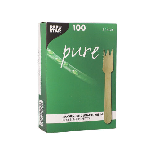 A green PAPSTAR "pure" box contains 100 wooden cake and snack forks (14 cm, serrated) in a cardboard tray. The front shows a fork image and German, French, and English text highlighting these as ideal cake and snack forks.