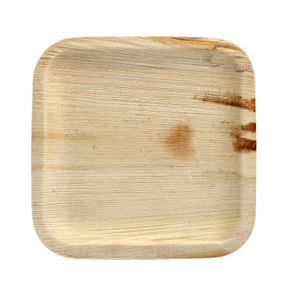 The PAPSTAR 25 plate from PAPSTAR GmbH is a square, light palm leaf plate with rounded corners, smooth texture, visible natural grain, and a dark brown stain on the right side – ideal for special occasions against a white background.