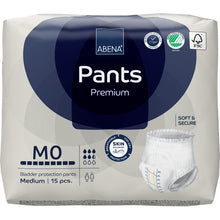 Ein 15er-Pack ABENA Pants Premium M der Abena Re-Seller GmbH zeichnet sich durch hohe Saugfähigkeit, "soft & secure" und "skin-friendly" Eigenschaften aus, mit Produkt- und Nachhaltigkeitssymbolen auf der Verpackung.