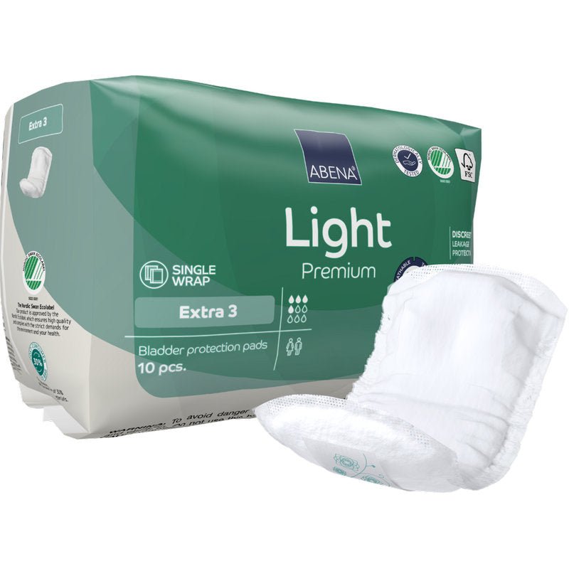 A pack of ABENA Light Extra 3, Premium from Abena Re-Seller GmbH contains 10 green-white bladder protection pads. A pad on the front shows the secure, discreet design for daily comfort.