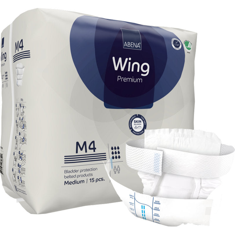 Abgebildet ist eine Packung ABENA Wing Premium von Abena Re-Seller GmbH mit 15 mittelgroßen Teilen und einem aufgeklappten Produkt an der Vorderseite - für optimalen Komfort und Schutz bei Blasenbedarf.