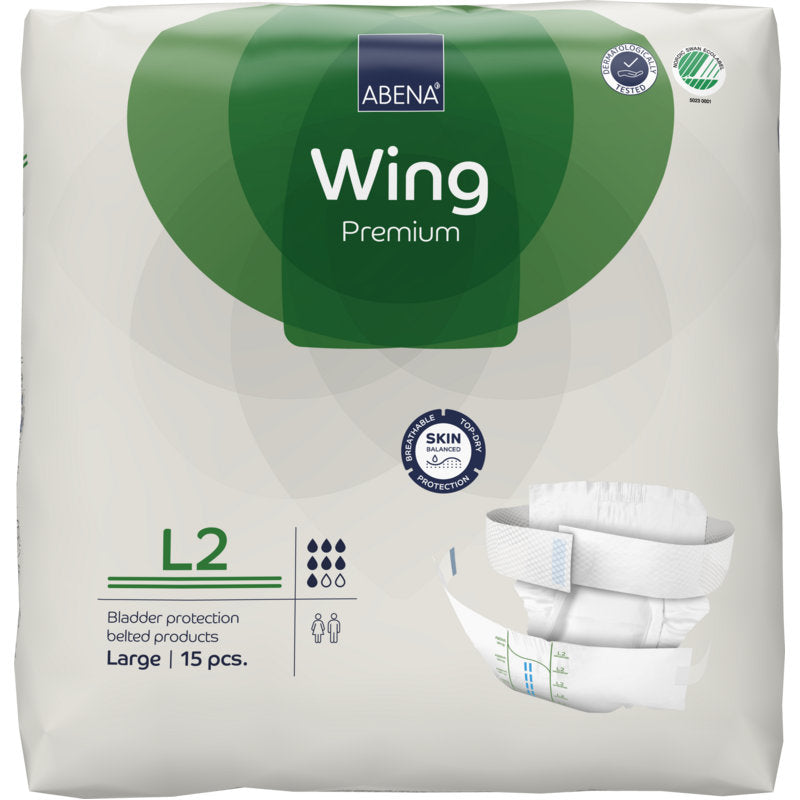 Verpackung der ABENA Wing Premium von Abena Re-Seller GmbH, Größe Large, 15 Stück. Die weiß-grüne Verpackung zeigt Produktdetails, ein Windelbild und betont "Schutz und Komfort" für zuverlässigen Blasenschutz.