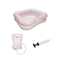 The discontinued item: AMPri washbasin with shower device and pump, inflatable by AMPri Handelsgesellschaft mbH with hand pump and water bag is presented for hair washing while lying down on a white background.