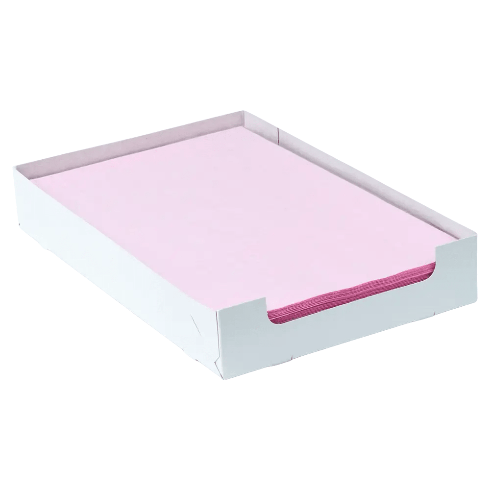 A stack of pink paper, similar to AMPri Dental crepe liner tray filter paper in various colors, is neatly arranged in a white tray. The low sides of the tray, manufactured by AMPri Handelsgesellschaft mbH, reveal the carefully aligned edges of the paper.