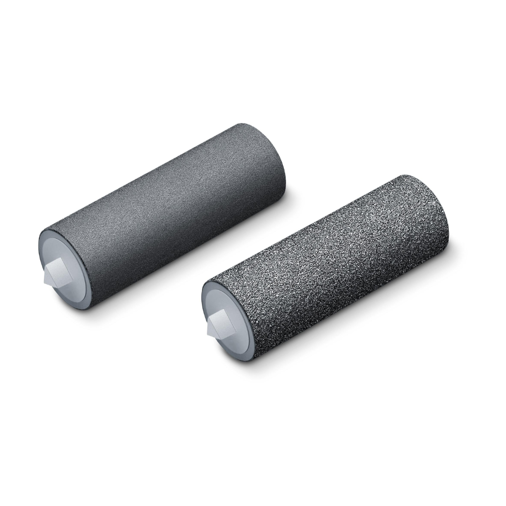 Two black and gray sandpaper rolls from Beurer GmbH (discontinued item: repurchase set MP 28, MP 55, pack of 2 pieces) for the Beurer MP 28 callus remover are depicted with white plastic caps on a white background.