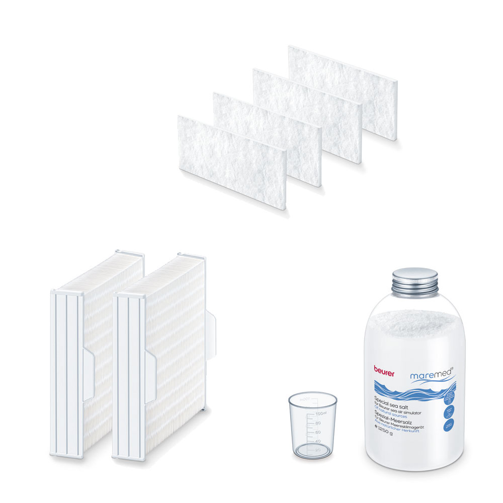 The illustration shows the components of the Beurer maremed® MK 500 salt & filter combo set. The set includes four white water filters, two rectangular filter cartridges, a white bottle labeled "maremed® MK 500" filled with special sea salt granules, and a small transparent measuring cup made of plastic.